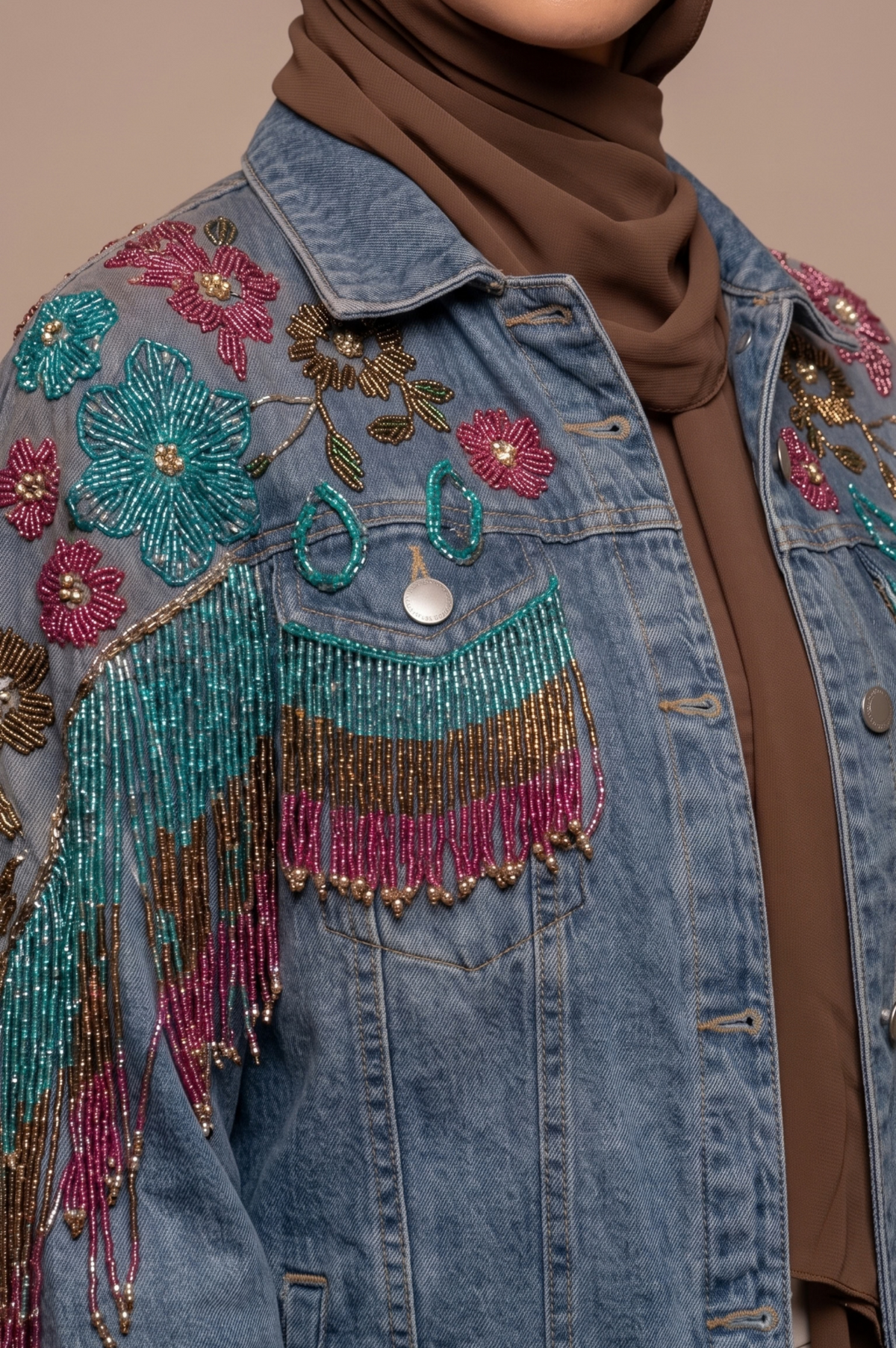 Farandole floral bead embroidery and multicoloured beaded fringe detail