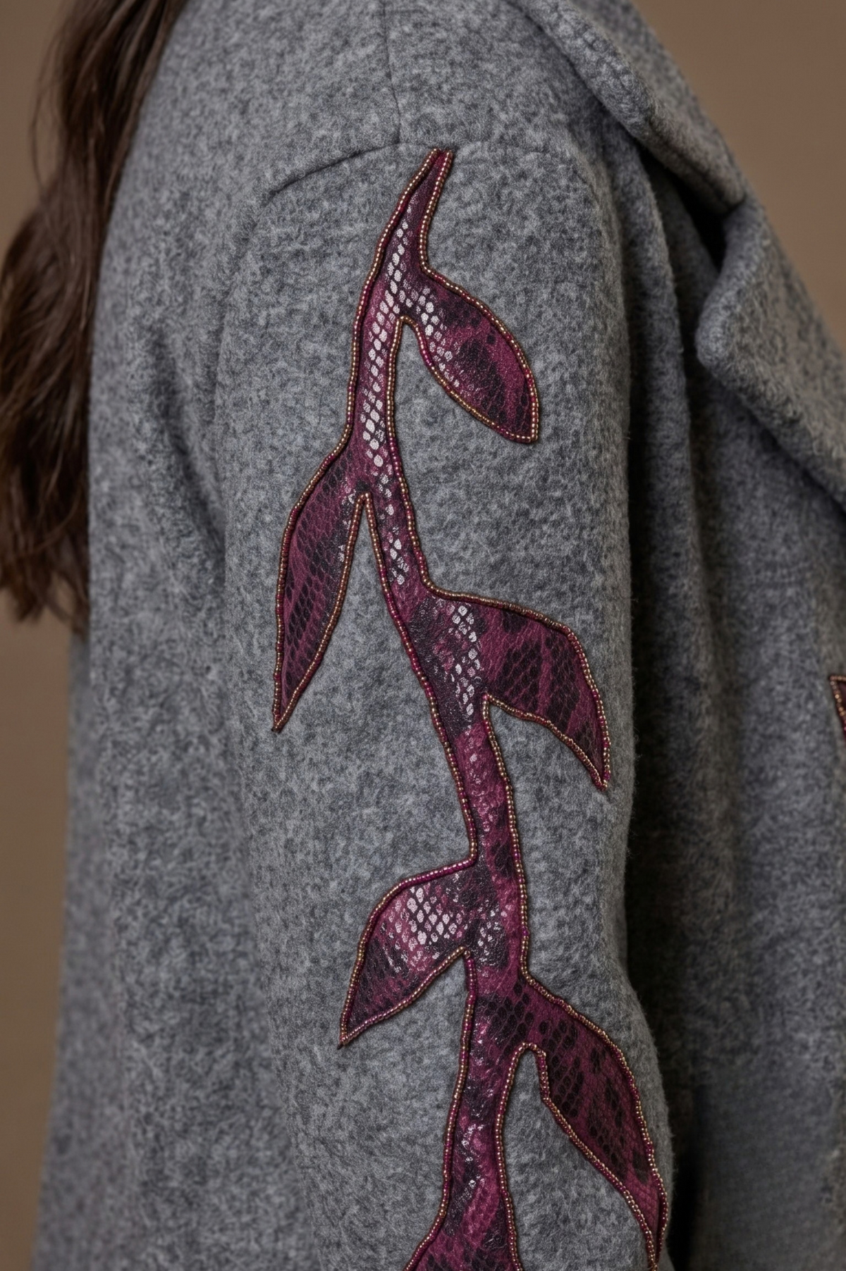 Vigne burgundy vine appliqué and bead edging detail