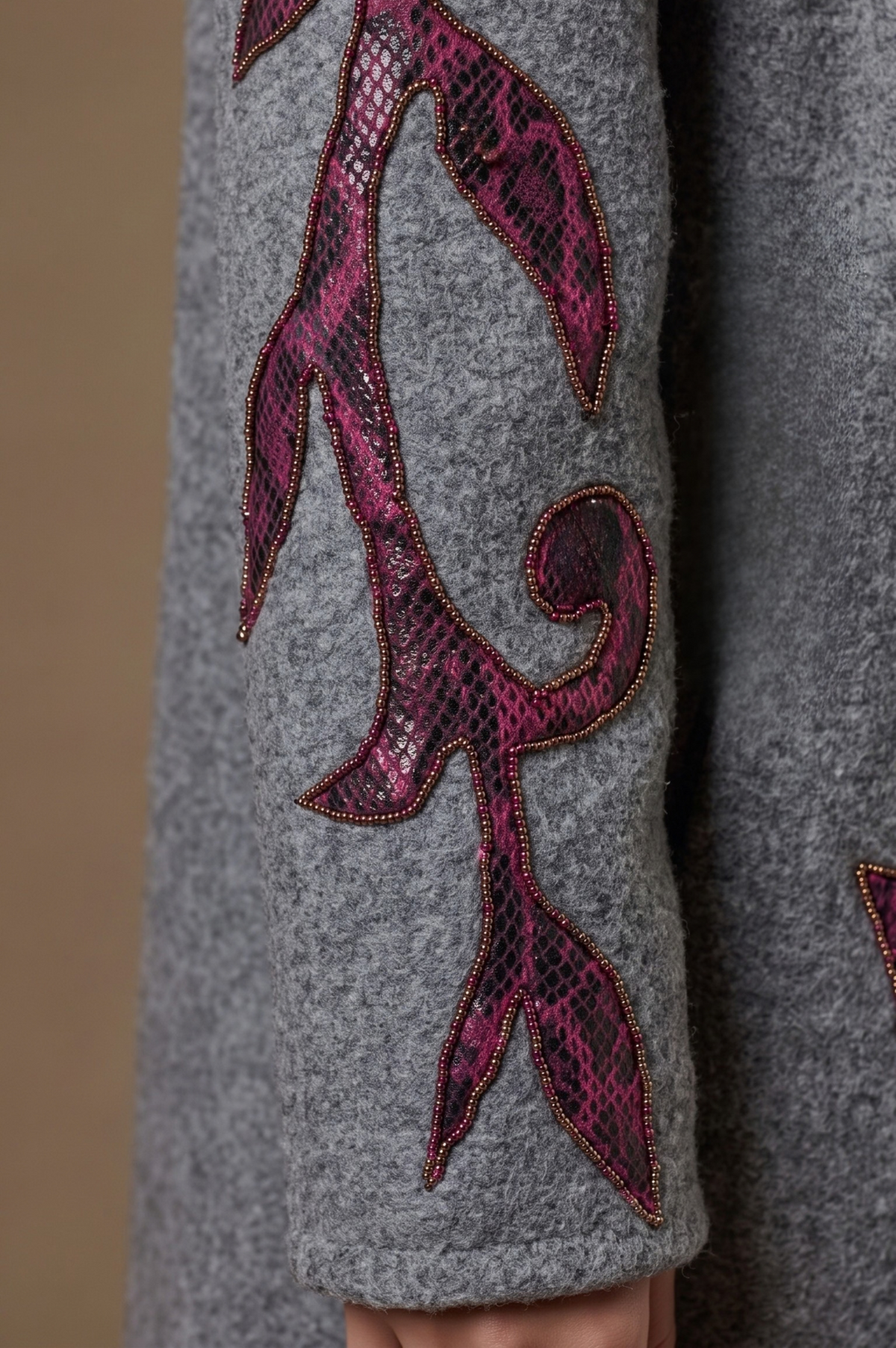 Vigne burgundy vine appliqué and bead edging detail